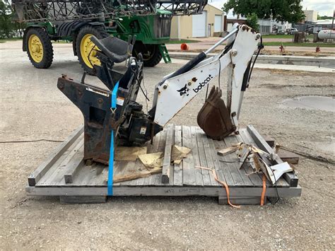 model 709 backhoe attachment for a bobcat skid steer|bobcat 709 backhoe specs.